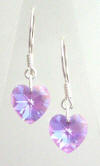 Pair of heart shaped Violet Swarovski earrings on sterling silver earwires.