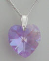 Lilac heart shaped pendant on sterling silver bail and chain.
