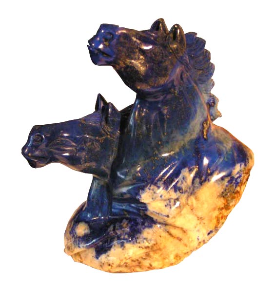 Carving in Lapis Lazuli of two horses heads.