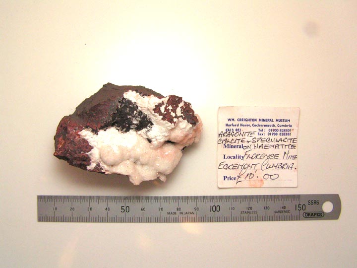 Specimen of Aragonite, Specularite and Calcite on Haematite.