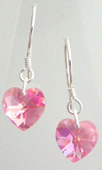 Heart shaped Swarovski crystal earrings on sterling silver earwires.